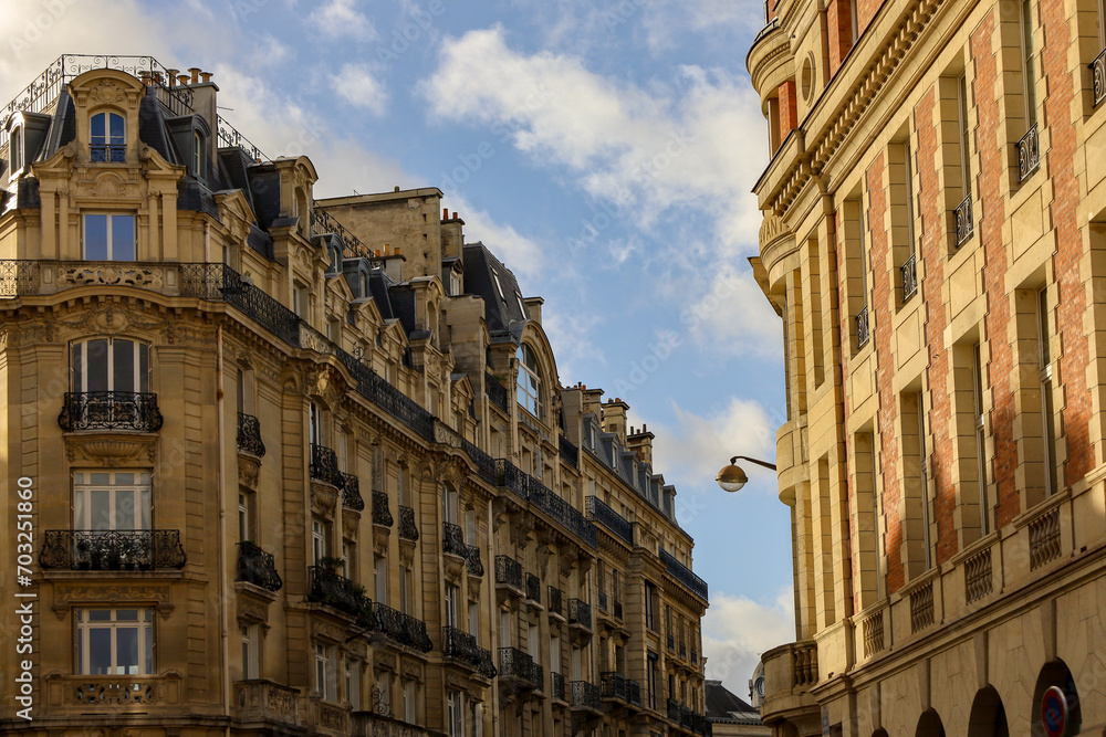 typical parisians building facade , haussmannian style  ,5th arrondissement