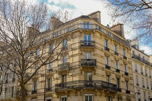 typical parisians building facade , haussmannian style , 2nd arrondissement