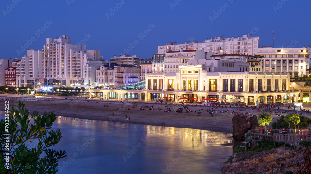 Biarritz, the famous resort in France. Night view of the main beach called La Grande Plage and city skyline.