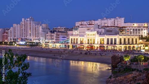 Biarritz, the famous resort in France. Night view of the main beach called La Grande Plage and city skyline.