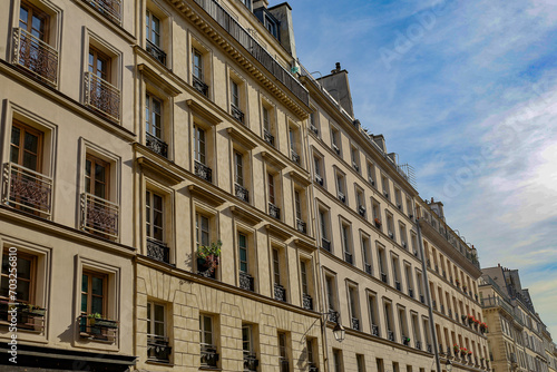 typical parisians building facade , haussmannian style  4th arrondissement © eric
