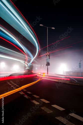 Long exposure of london bus on a foggy night