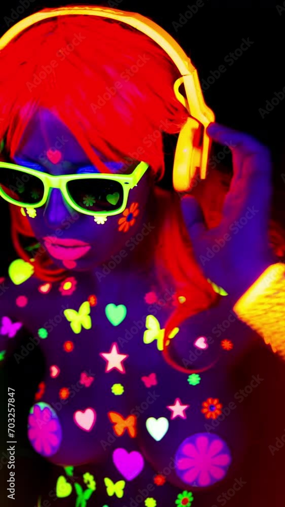 Female dancer in glow UV costume Female dancer in glow UV costume