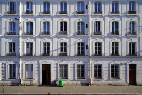 typical parisians building facade , haussmannian style 15th arrondissement