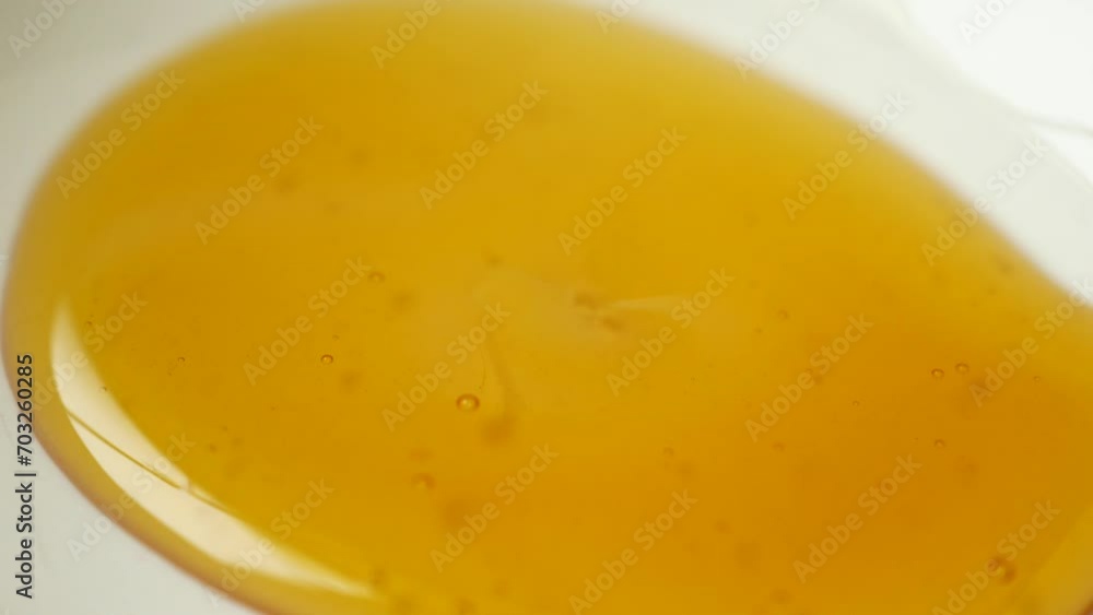 Honey isolated on white background, top view Honey isolated on white background, top view