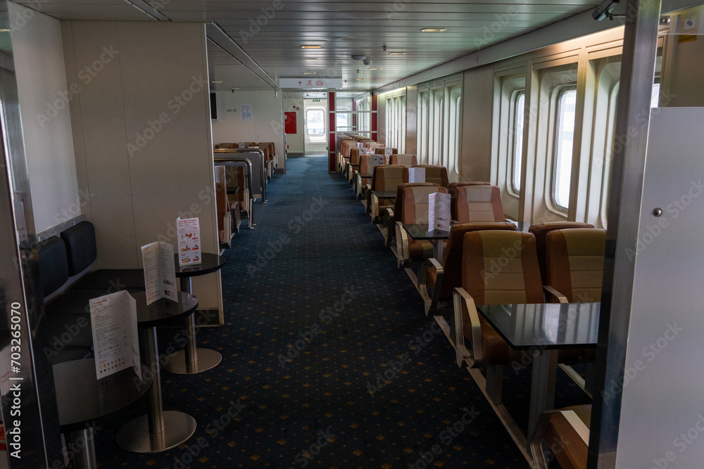 The empty restaurant of a ferry crossing the sea. High quality photo. Travelling, bar, empty, alone