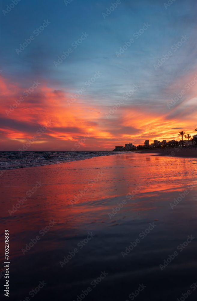 Sunset at the costa del Sol Beach, in Malaga.