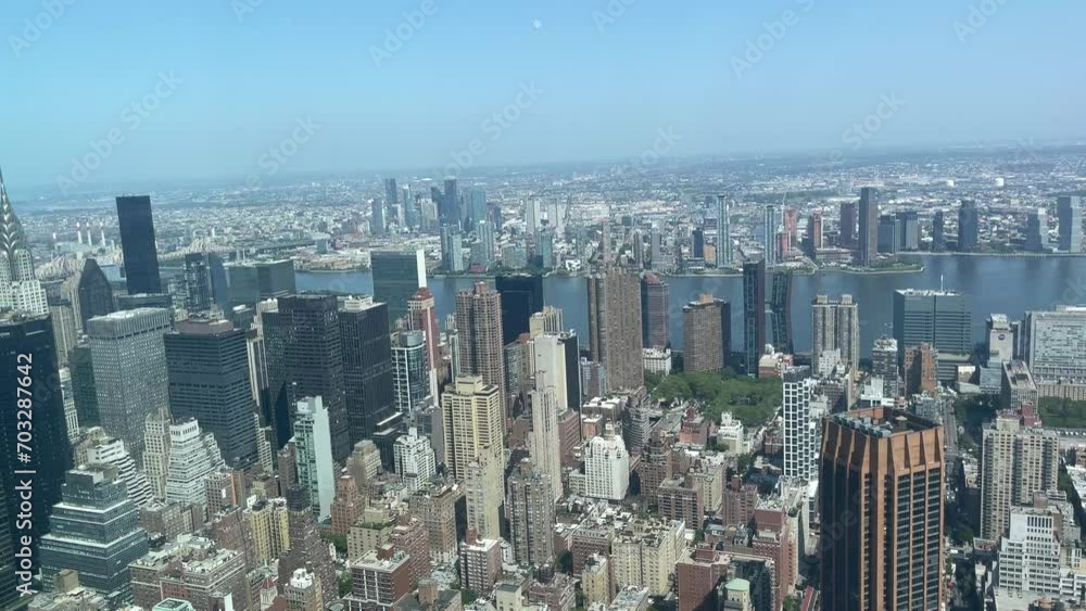 Enjoying the Manhattan skyline from the Empire State Building, one of the most famous skyscrapers of the Big Apple in New York (USA). Enjoying the Manhattan skyline from the Empire State Building, one of the most famous skyscrapers of the Big Apple in New York (USA).