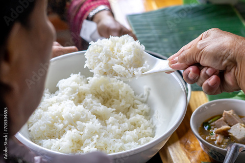 Defocussed of Cooked white rice in bowl. Thai jusmine rice is white and have tasty photo