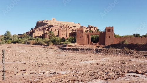 Ksat ait Ben Haddou village, built with earth and clay, ancient mud-brick architecture and labyrinth of narrow streets was a stop at the caravan route in Sahara desert, Morocco. photo