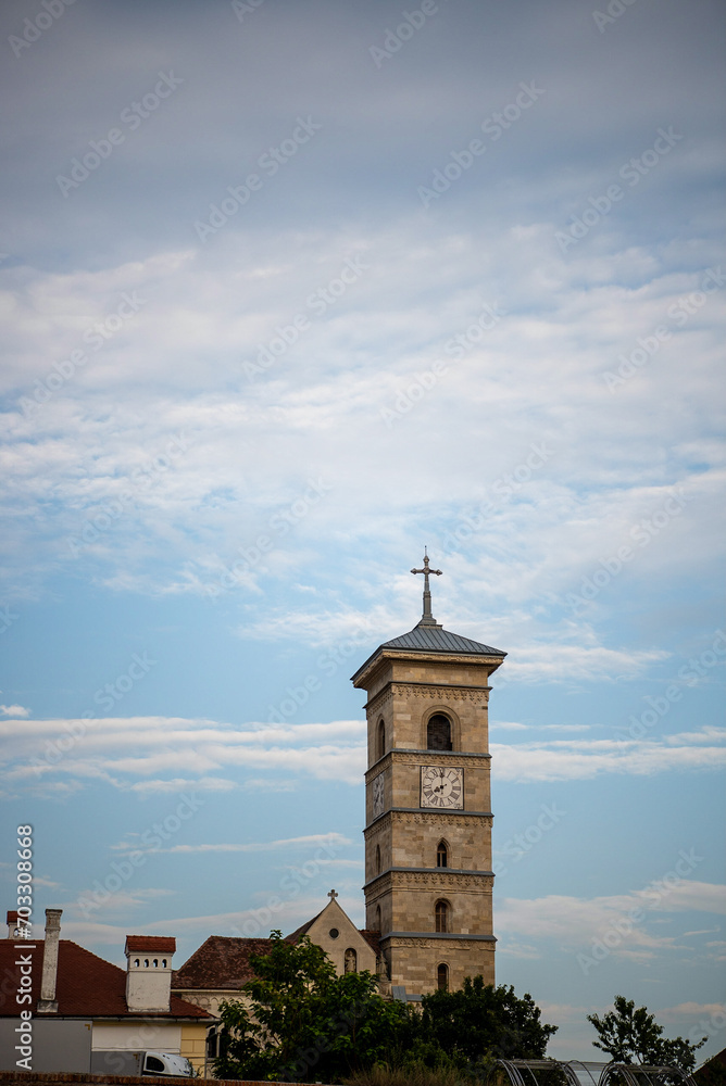 The tower of the Romanian Orthodox church in blue sky
