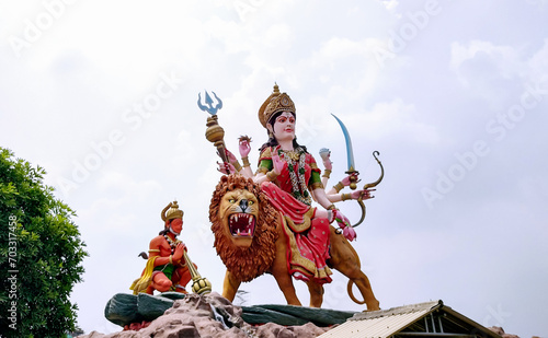 Statue of Maa Vaishno Devi beautiful image of maa durga with lion sitting with hanumaan photo