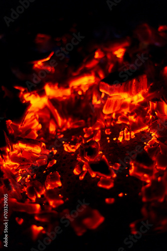 Burning coals in the night. Extinguished fire