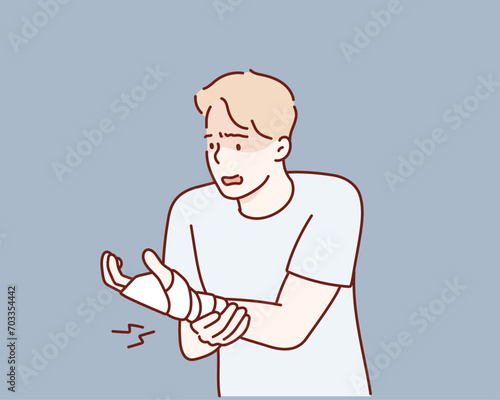 man with gauze bandage wrapped around injury hand. Hand drawn style vector design illustrations.