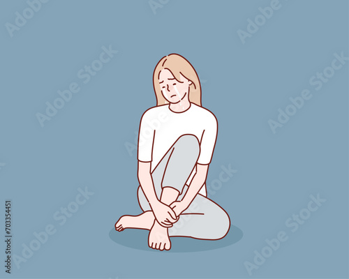 Sad and lonely teenager girl sitting in lotus position on the floor and lowered her head down. Depression, sorrow, sadness, mental disorder, illness. Hand drawn style vector design illustrations.