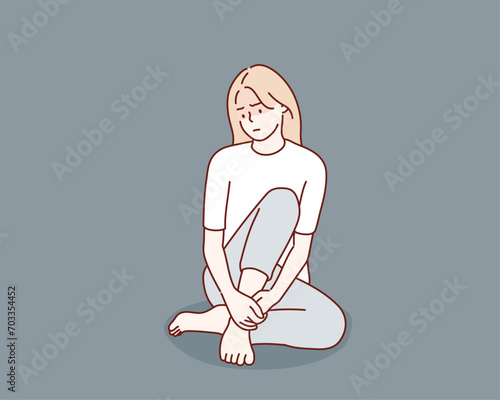 Sad and lonely teenager girl sitting in lotus position on the floor and lowered her head down. Depression, sorrow, sadness, mental disorder, illness. Hand drawn style vector design illustrations.
