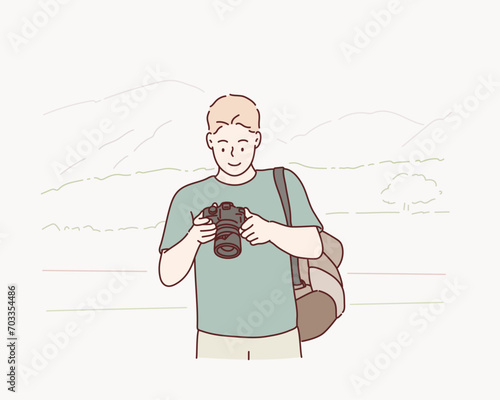  man taking photos with vintage camera outdoor. Hand drawn style vector design illustrations.