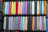 There are many colorful ties on display at the exhibition. Large range of products for the buyer to choose from