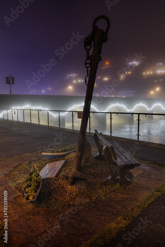 Misty Christmas lights at Looe Bridge old anchor and seats