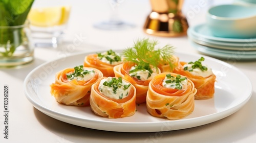  a white plate topped with rolls covered in cream cheese and garnished with a sprig of parsley.