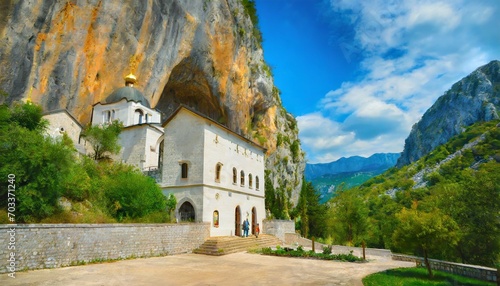 the old famous monastery ostrog in the rocks montenegro photo