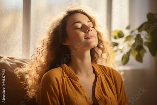 A person practicing deep breathing exercises, emphasizing the calming effects of mindful breathing on the nervous system. photo