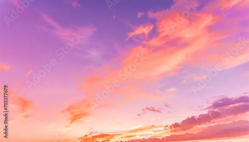 beautiful pastel pink and purple skies and clouds at night as the sun sets