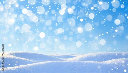 winter natural snow background with snowdrifts beautiful light and snow flakes on blue sky beauty bokeh circles copy space © Debbie