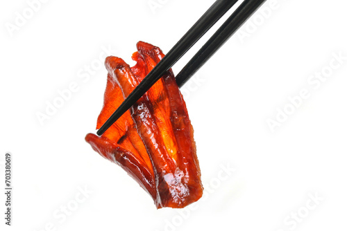 close up roasted duck with chopsticks, Chinese culture food