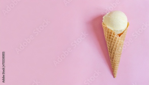 ice cream cone isolated on a pink background copy space