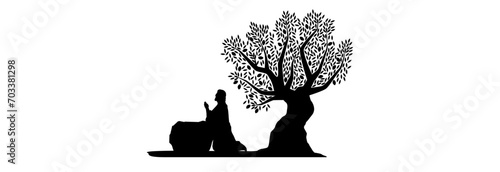 Jesus Christ prays in the Garden of Gethsemane near the olive tree.