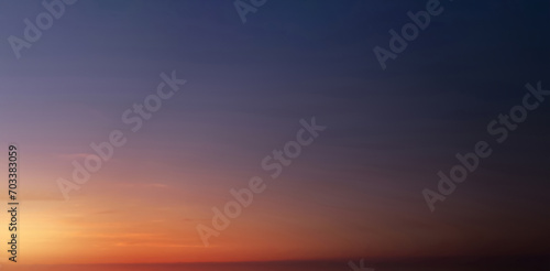 Sunset Sky,Clouds over Beach in the evening with Blue,Red, Orange,Yellow and Purple Sunlight in Summer,Beautiful panoramic nature sunrise, Romantic sky with Dusk Twilight © Anchalee