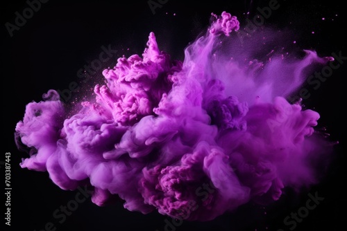 Explosion of lilac colored powder on black background