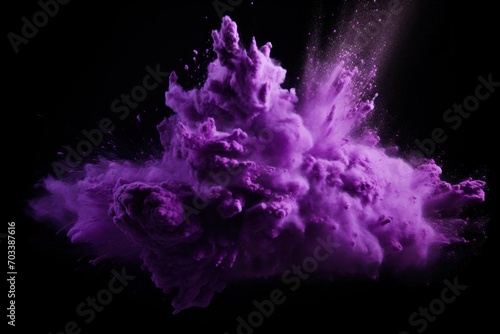 Explosion of lavender colored powder on black background