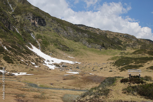 Waterfalls on the way to mountain water reservoirs in Kaprun, Austria photo