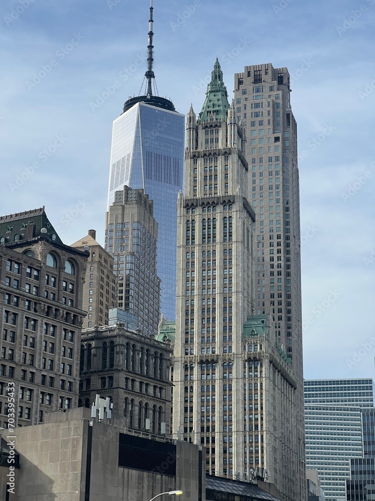 view of several skyscrapers, including the World Trade Centre in the background and the Woolworth Building in the foreground