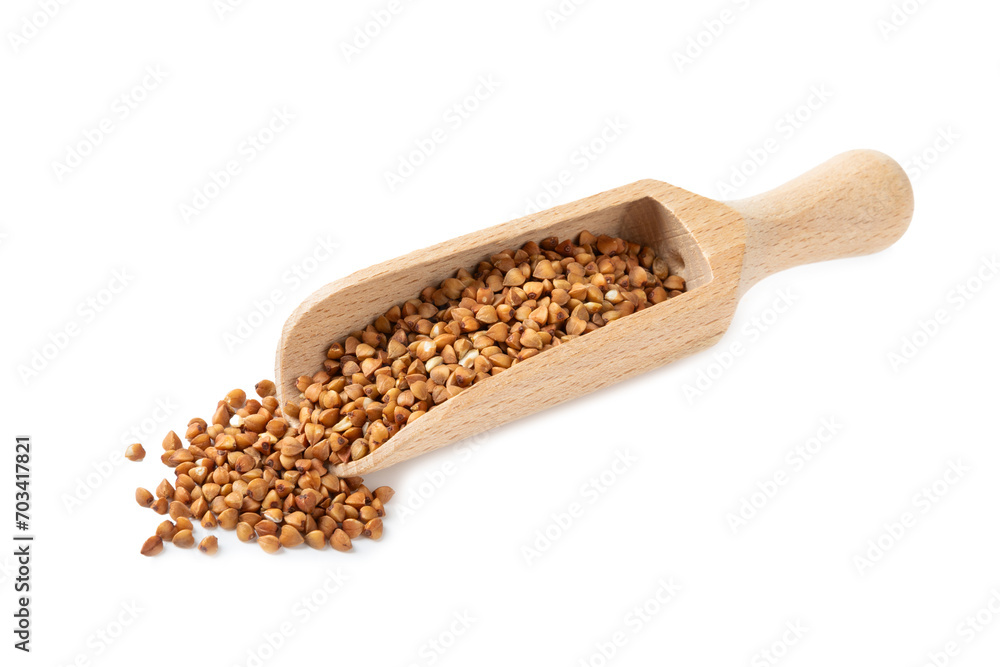 Buckwheat in wooden spoons. Buckwheat grain isolated on white background. Healthy food. Porridge. Diet. Organic cereal Buckwheat in wooden spoons. Buckwheat grain isolated on white background. Healthy food. Porridge. Diet. Organic cereal