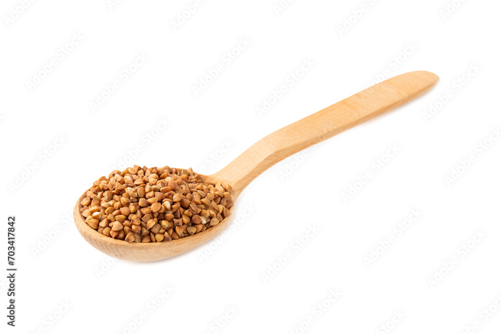 Buckwheat in wooden spoons. Buckwheat grain isolated on white background. Healthy food. Porridge. Diet. Organic cereal Buckwheat in wooden spoons. Buckwheat grain isolated on white background. Healthy food. Porridge. Diet. Organic cereal