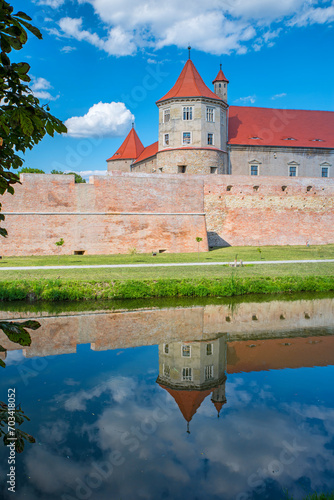 Summer scene with mirroring fortress
