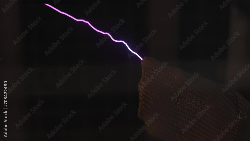 Electrical Discharge Demonstration. Electric arc between two nodes ...