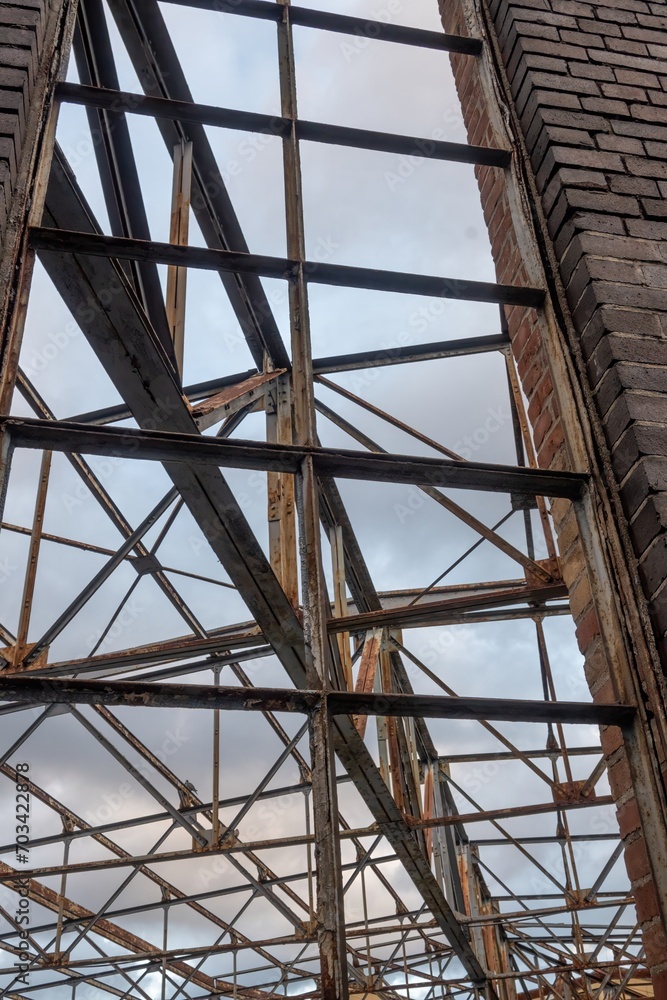 rusted roof truss of an old industrial building