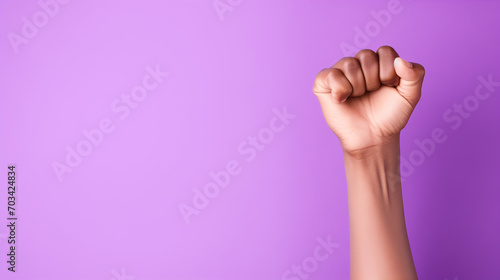 Fist punching the air, Hands of the person, Raised purple fist of a woman copy space on background, Ai generated image