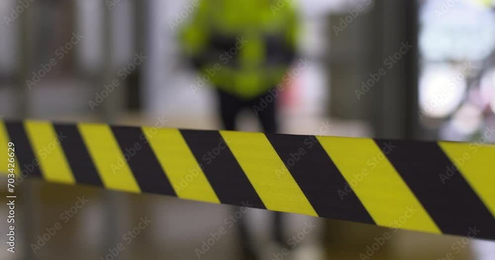 Safety exclusion hazard tape crime scene barrier yellow and black