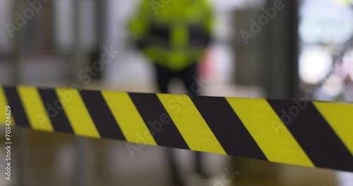 Safety exclusion hazard tape crime scene barrier yellow and black stripes no entry
