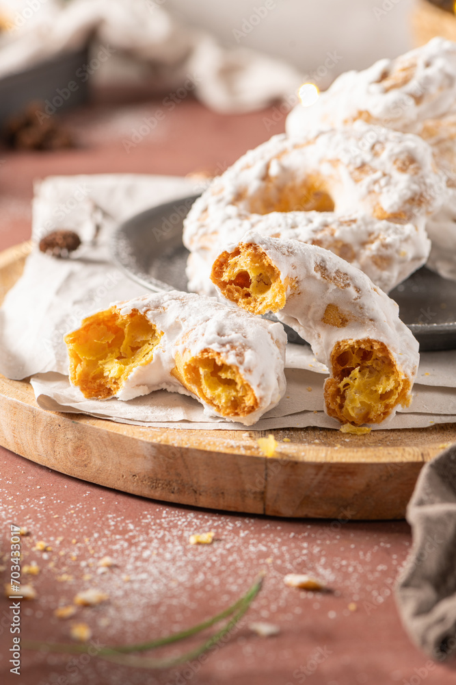 Fototapeta premium Portuguese sweets named argolas das Caldas - Rings from Caldas. Typical glazed cookies with sugar. Regional sweet from Caldas da Rainha, Portugal.