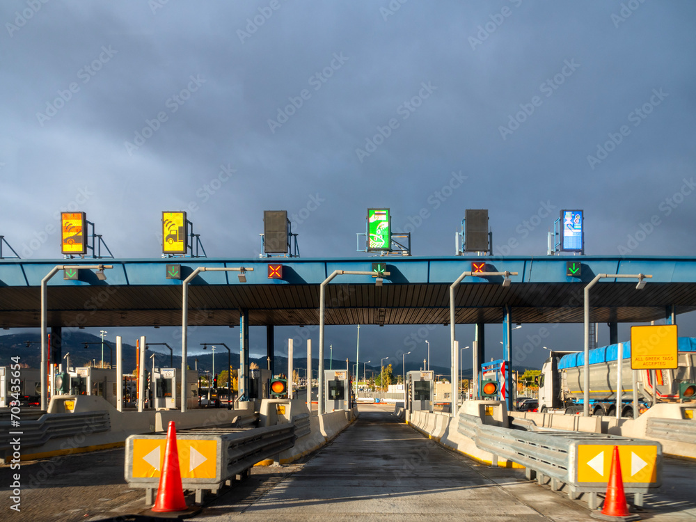 Trip on the toll highway Athens-Thessaloniki, past cars, toll checkpoints in Greece