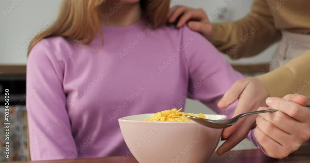 With care hands mother crafts wholesome breakfast Mother's care captured in cinematic close-up view. This meal daily testament to mother's care sets a loving tone for her daughter's day. With care hands mother crafts wholesome breakfast Mother's care captured in cinematic close-up view. This meal daily testament to mother's care sets a loving tone for her daughter's day.