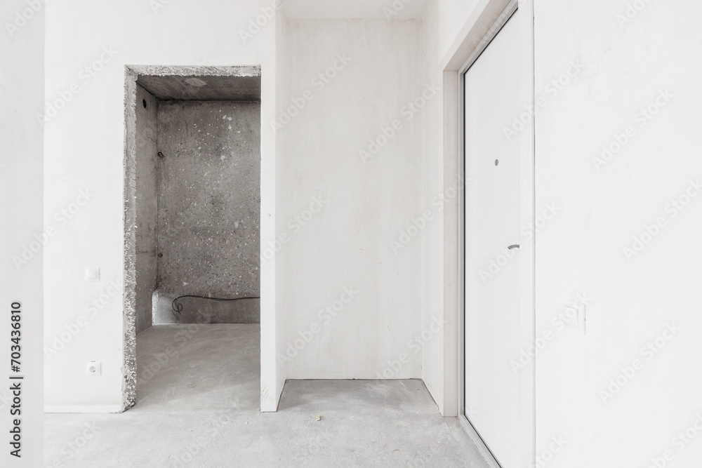 interior of the apartment without decoration in gray colors. rough finish interior of the apartment without decoration in gray colors. rough finish