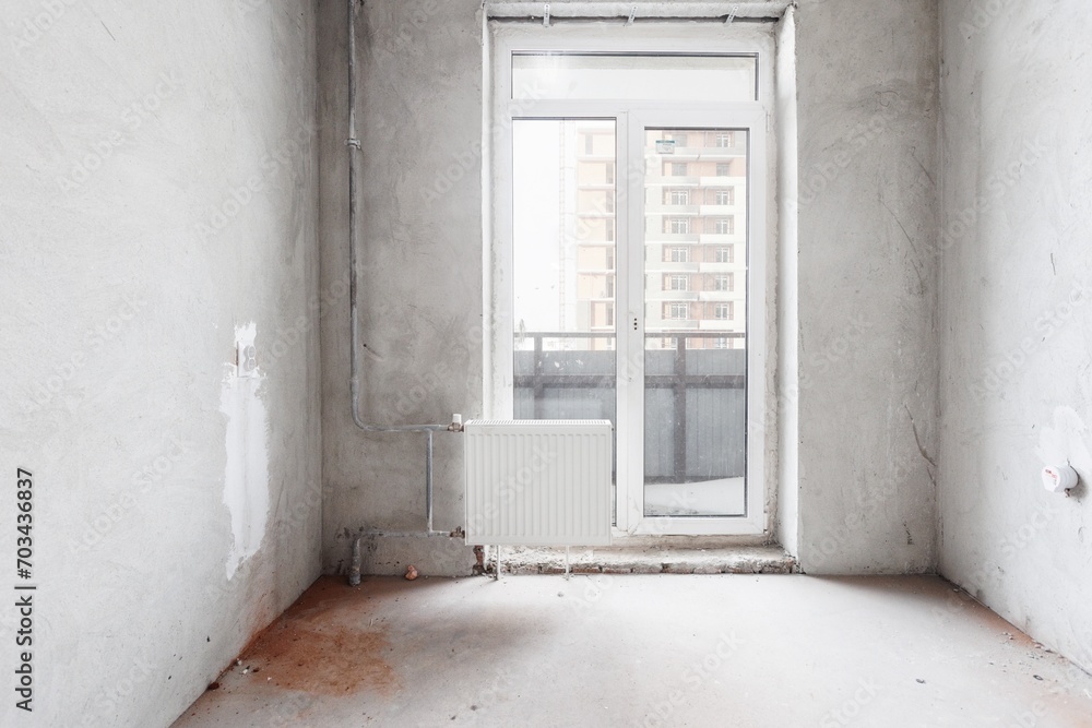interior of the apartment without decoration in gray colors. rough finish interior of the apartment without decoration in gray colors. rough finish