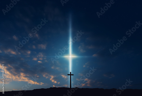 A cross standing on a dark sky with a cross light on it